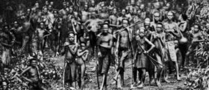 Group of Kongo people standing and staring